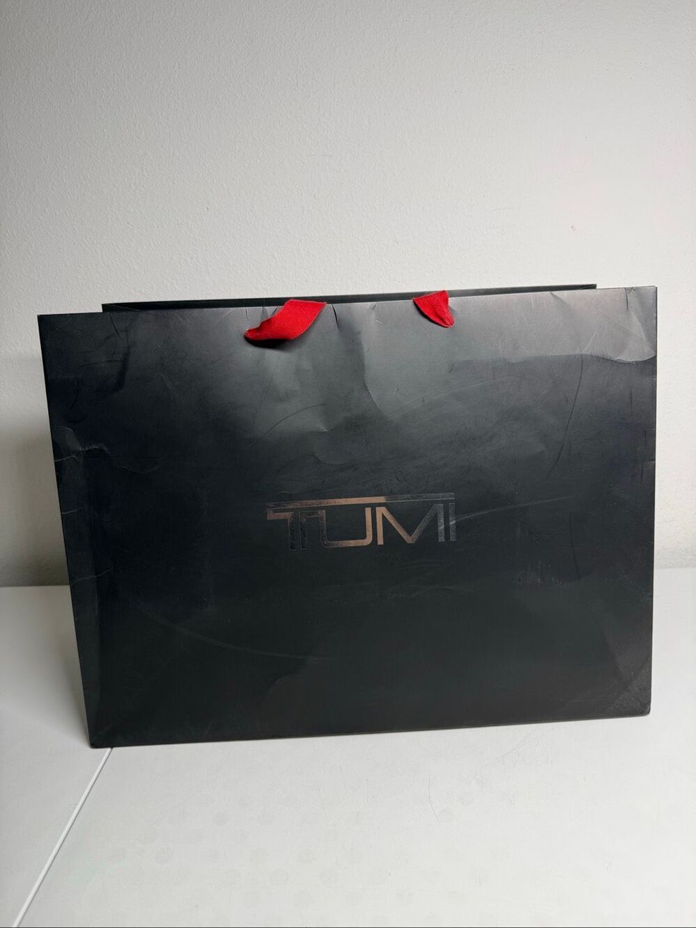 TUMI Black Paper Shopping Gift Bag Red Handles Large Branded Retail Bag
